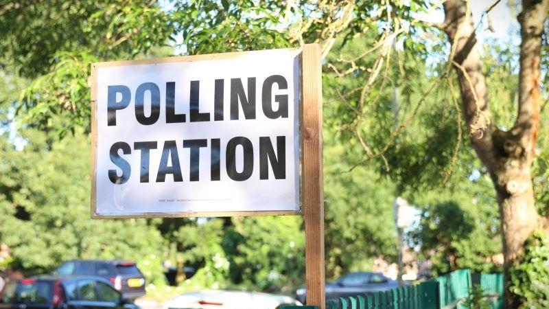 Sign placed outside with the words Polling Station.