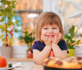 Image of a young child smiling.