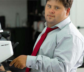 Image of a young person in a suit.